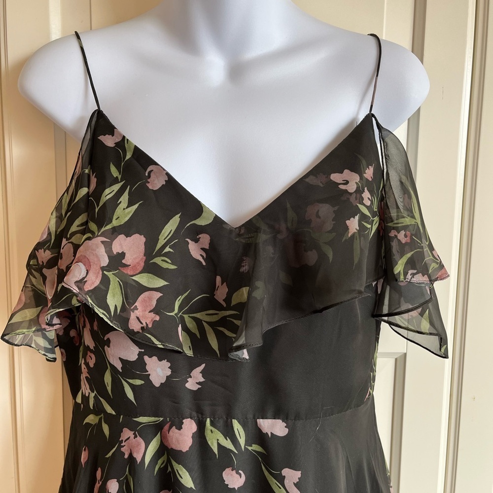 Jenny Yoo Cassie
Flutter Sleeve
Surplice Gown
Black with Floral Pattern. - Picture 15 of 16